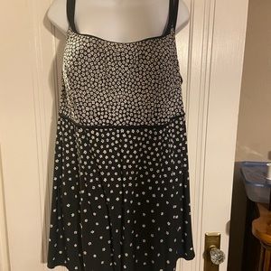 So fun swim dress. Black and white small floral print. Excellent condition.